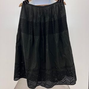 black skirt with lace hole details